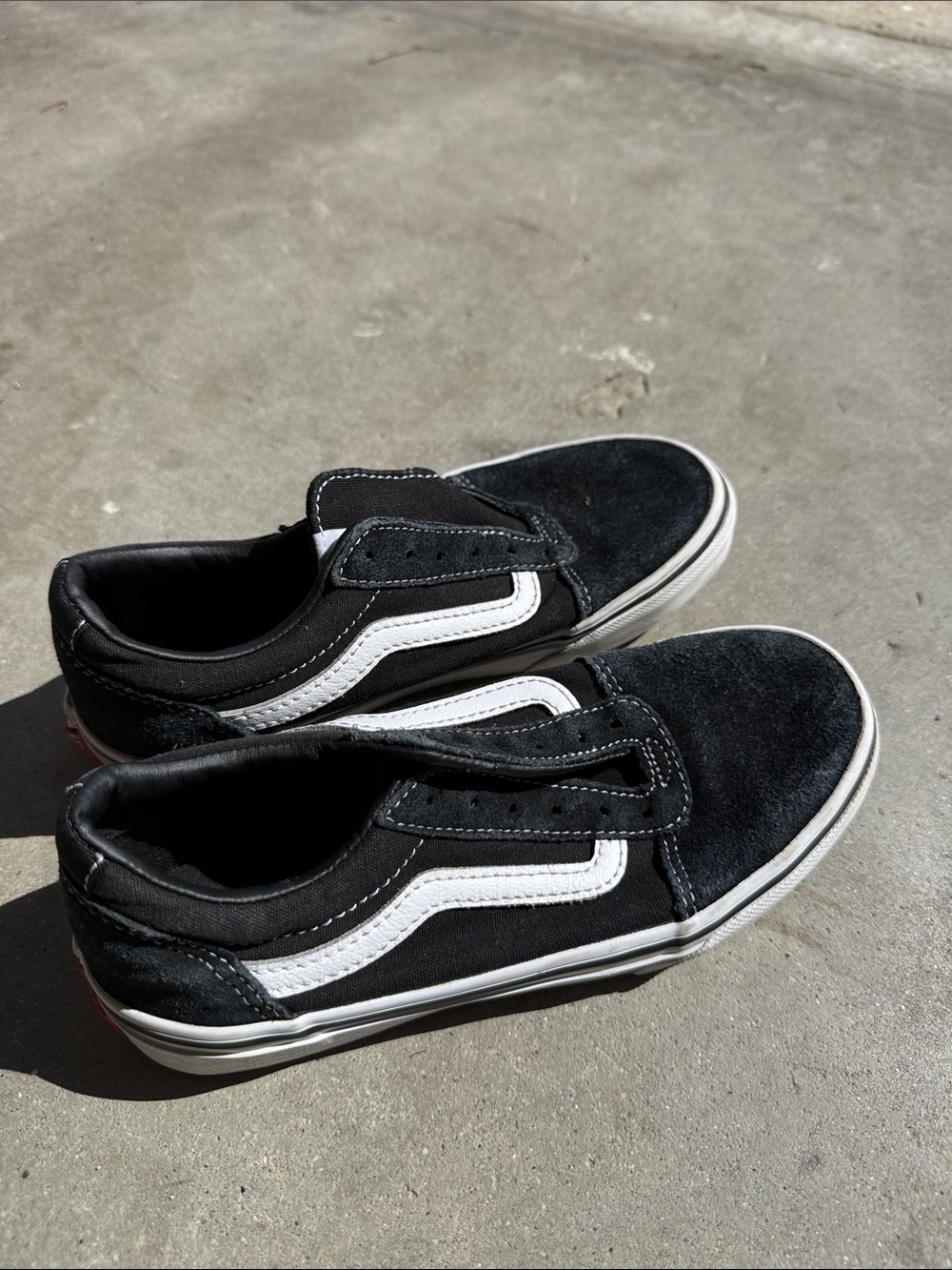 Vans Kids Black and White Slip-On Style Skate Sneakers